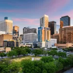 Downtown Houston skyline at sunset – showcasing the vibrant business hub ideal for web development services in Houston TX.