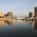 Corpus Christi skyline and marina at sunrise – ideal setting for businesses seeking professional web development services.